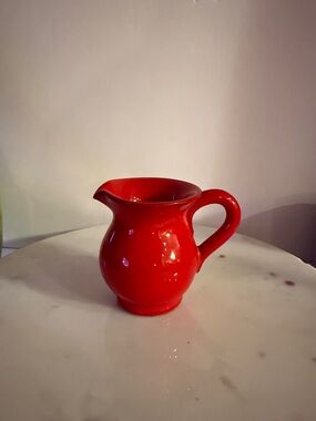 Glossy Red Ceramic Pitcher with Signed Base Italy is written on bottom